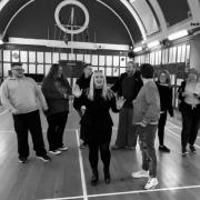 Cast during rehearsal for Wallasey Musical Theatre Company's production of 'Legally Blonde: The Musical'