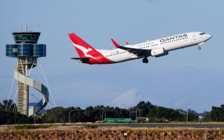 Qantas agrees to payouts for selling seats on cancelled flights (Mark Baker, AP)