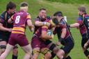 Caldy's Harrison Crowe taking on Sedgley Park the last time the teams met