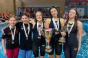 Some of the successful swimmers with their trophies