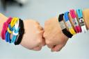 Cancer Research UK is encouraging Wirral people to wear a unity band or make a donation on World Cancer Day