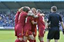 Players celebrate Connor Jennings first goal. All pictures: Tony Coombes