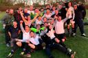 A jubilant Sutton Athletic celebrate retaining the CWFL Queensferry Sports Premier Division title this week after a 2-0 win over Helsby on Wednesday