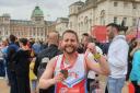 Globe sports reporter Richard Garnett celebrates fulfilling a lifelong ambition on Sunday by completing the 39th London Marathon.