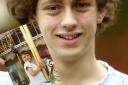 MEMORIES: Matthew with a photograph of his sister Rebecca