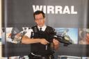 DANGER ALERT: Cons Paul Thompson with the imitation firearm that was seized