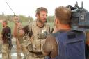 HOME FOR CHRISTMAS: Lieutenant McLeod being interviewed for UK television in Afghanistan earlier this year