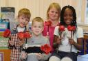 Pupills from Ladymount Primary with their poppies. Picture: Paul Heaps