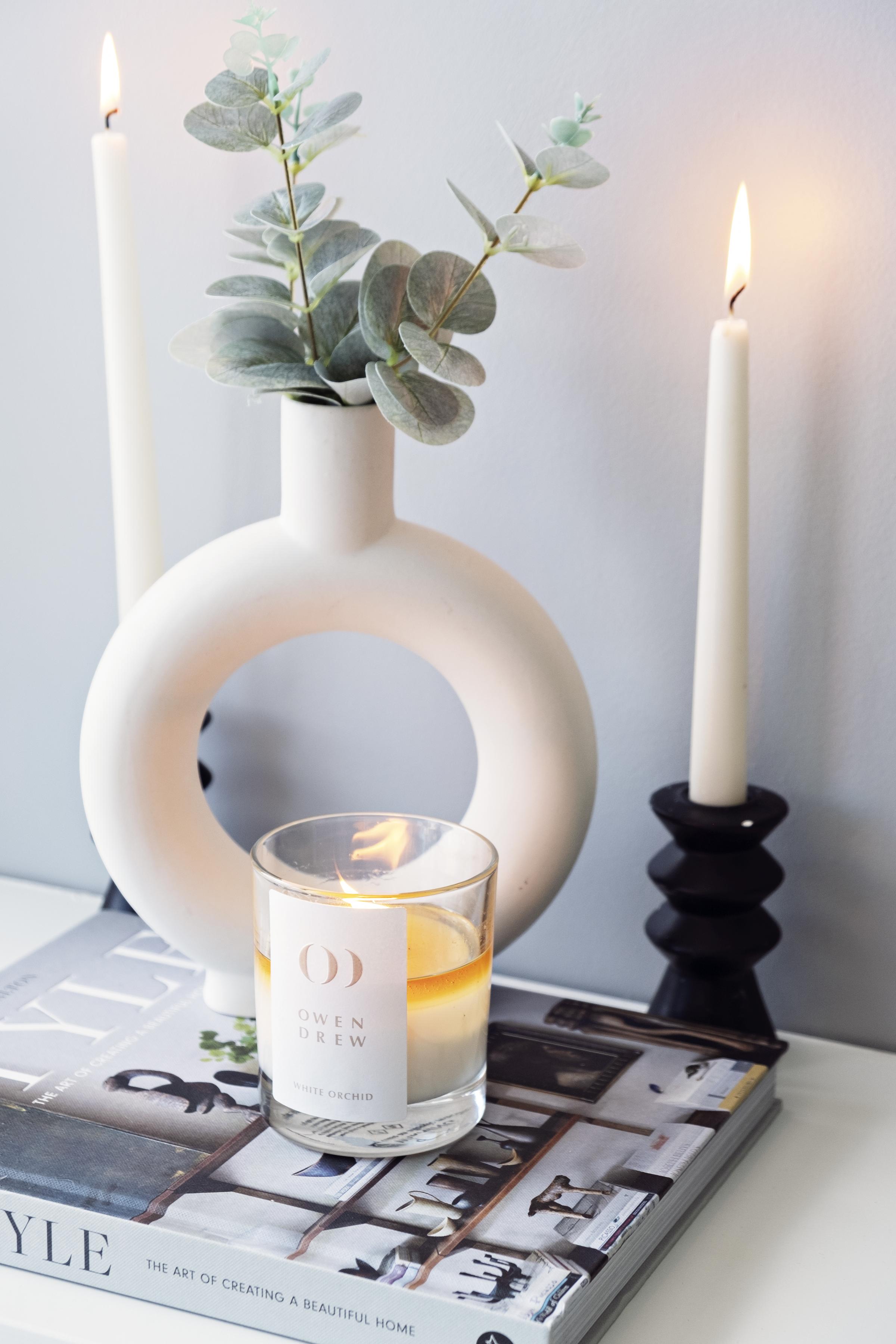 A white orchid candle