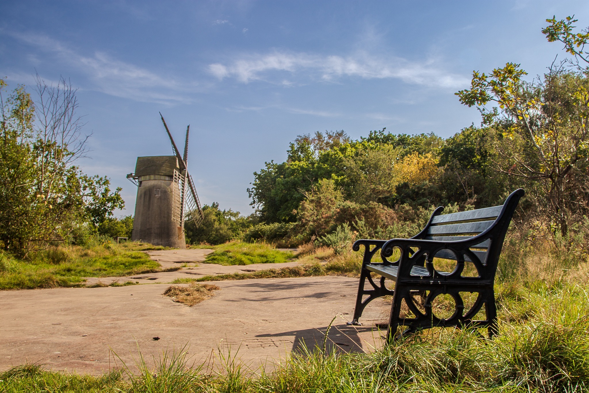 Old Bidston windmill and a modern bench by Tracey Rennie