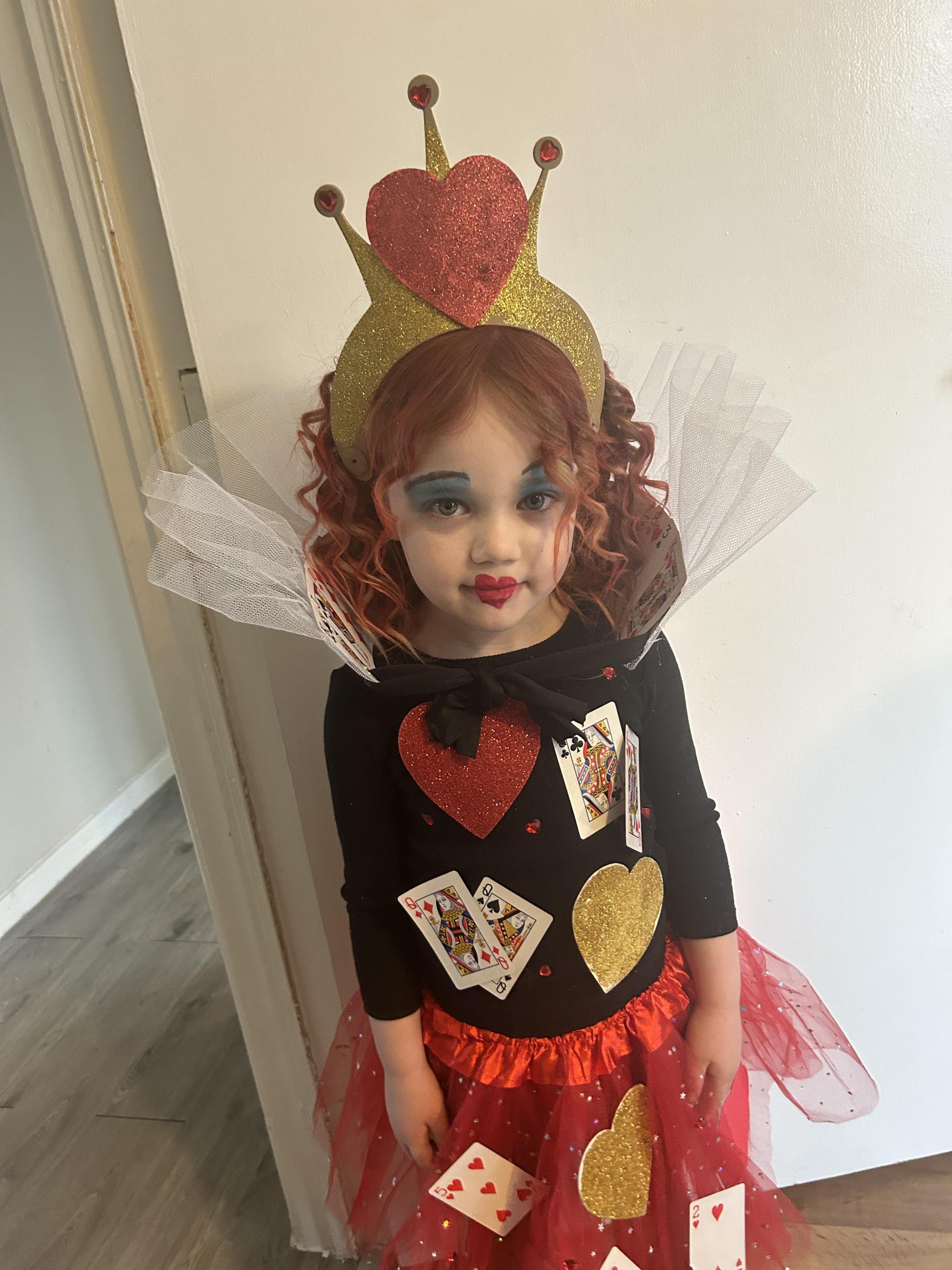 Four-year-old Rose Parry from Eastham as The Queen of Hearts