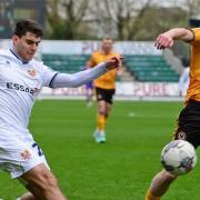 Tranmere's Robbie Apter takes on the Newport County defence