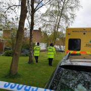 Police at the scene in Spital where a woman, 90, was found dead