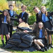 Students from Woodchurch High School in the new poppy garden. Pictured from left is, Lucille Ruiz, Cameron Kinch, Craig James, James Sheppard, Leah Fessey and Eve Scoble
