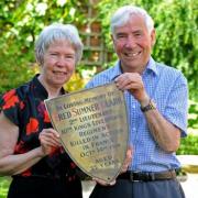 Diane and John Robinson with the plaque commemorating Lt Fred Sumner Clark.