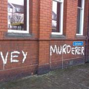FLASHBACK: 'McVey Murderer' graffiti scrawled across town hall on March 28