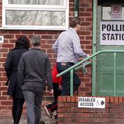 Wirral West voters make their way to the polling booths at Newton Village Hall