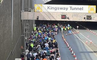 Runners enter the Kingsway Tunnel