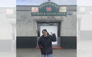 Back where it all began. Rob Fennah outside Wellmans Sports & Social Club in Anglesey, where he played his first paid gig 50 years ago, during recent return visit