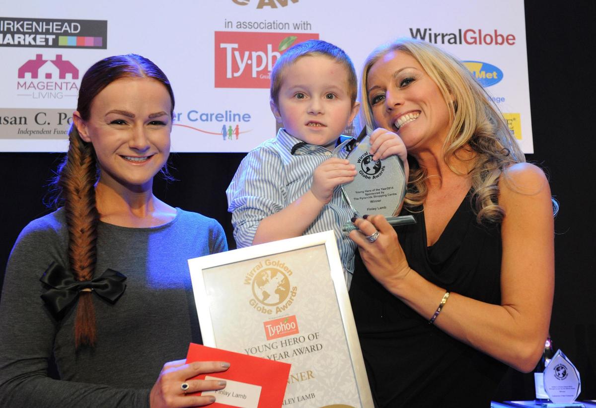 Young Hero of the Year award winner Finley Lamb reveives his award from British Council of Shopping Centre's retail apprentice Donna Williams and Wirral actress Suzanne Collins.