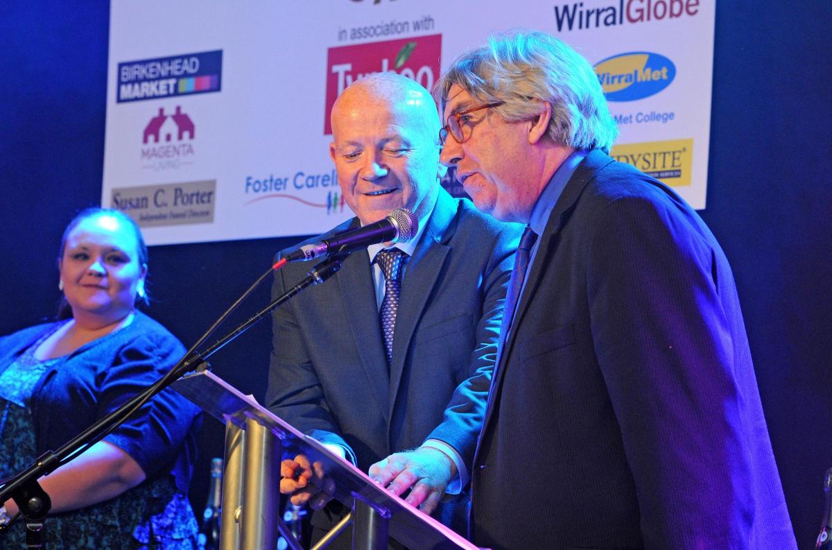 Globe columnist Peter Grant hosts the raffle alongside awards night host Roger Lyon.