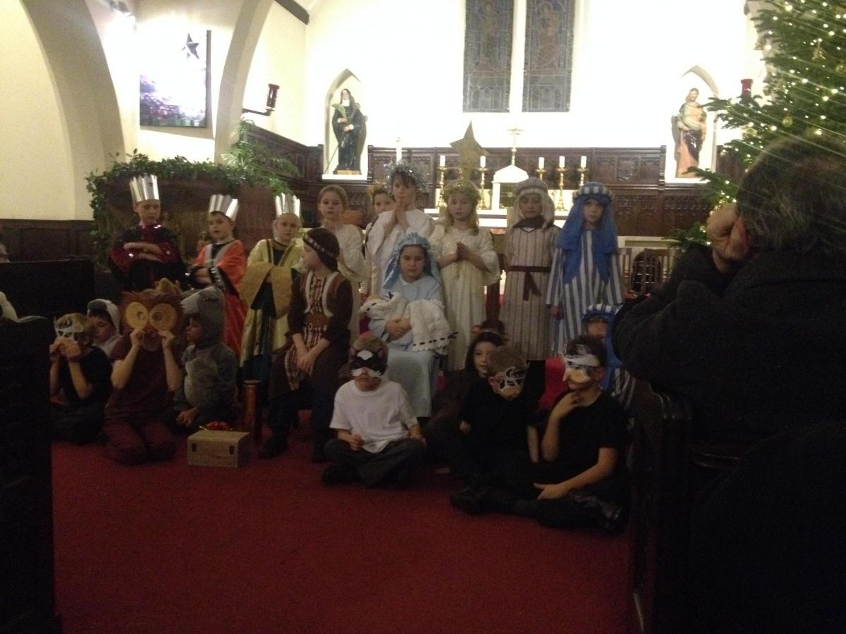 Children from St Winefrides Primary School perform their nativity at St Winefride's Church.