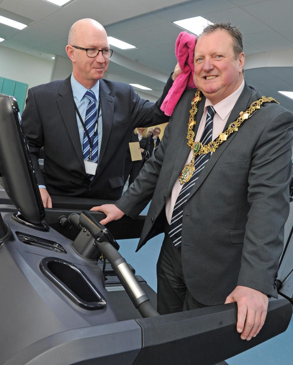 Wirral mayor Councillor Steve Foulkes tests out the equipment, pictured together with team leader, Martin Simmons