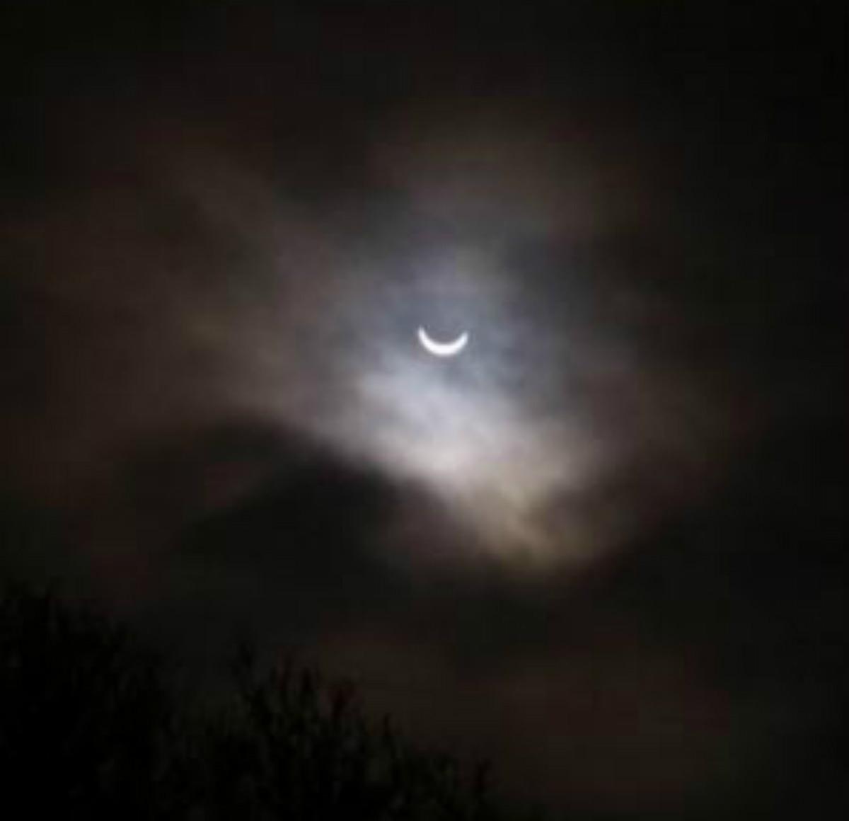 Mike Roberts sent in this eerie picture of this morning's eclipse.