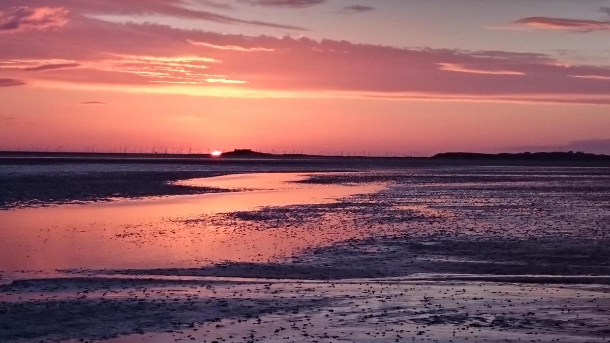 Janet Griffiths from Moreton sent in this picture of the sun setting over Hilbre Island.