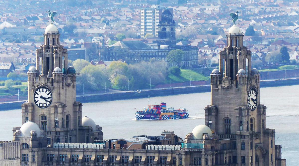 The newly painted Mersey Ferry framed by the towers of the Liver Building.
Taken from the top of the Anglican cathedral 
Picture by Mike Shaw