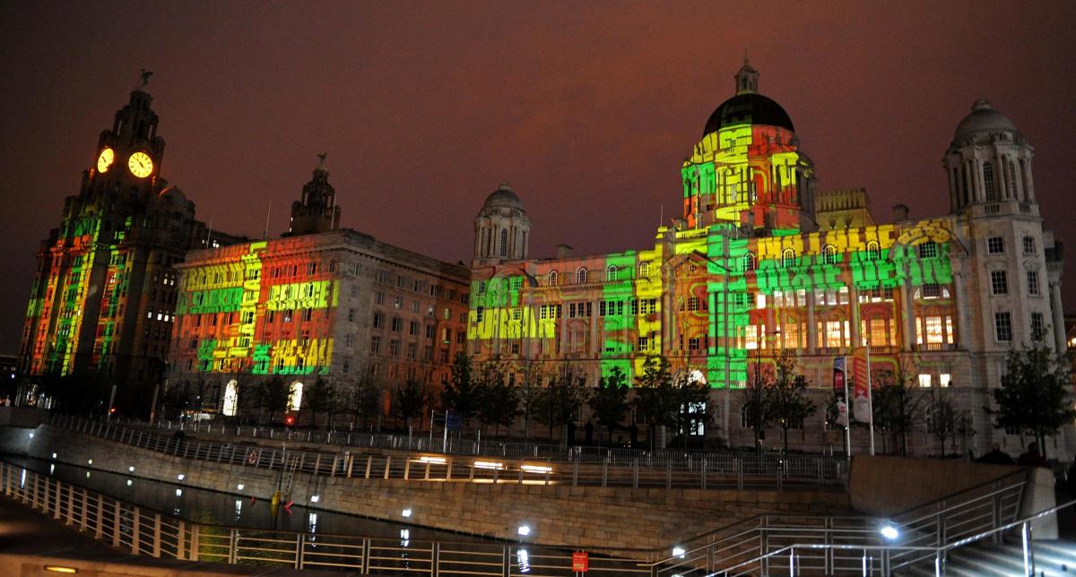 The three Liverpool graces  awash with colour for the visit of the Cunard cruise ships