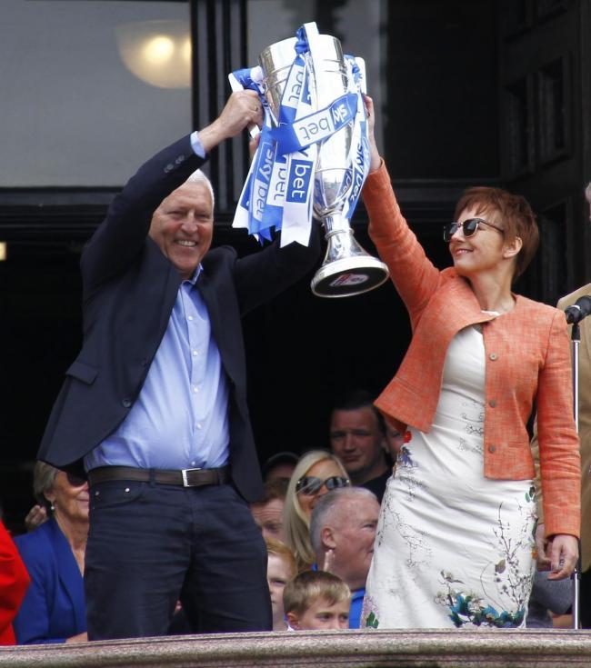 Tranmere Rovers chairman and vice-chairman Mark and Nicola Palios celebrating the club's promotion to League One