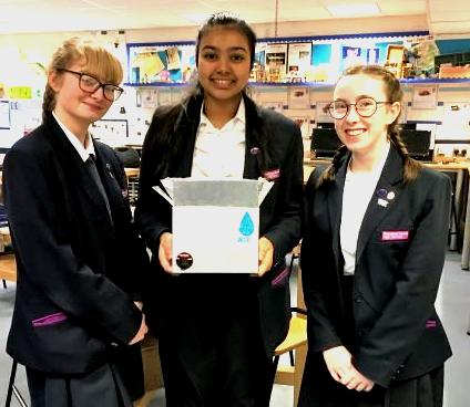 Emma Baldwin-Quirk, Sanjita After and Libby Evans from  Weatherhead High School in Wallasey with  their 'Water Aid Filtration Crate'