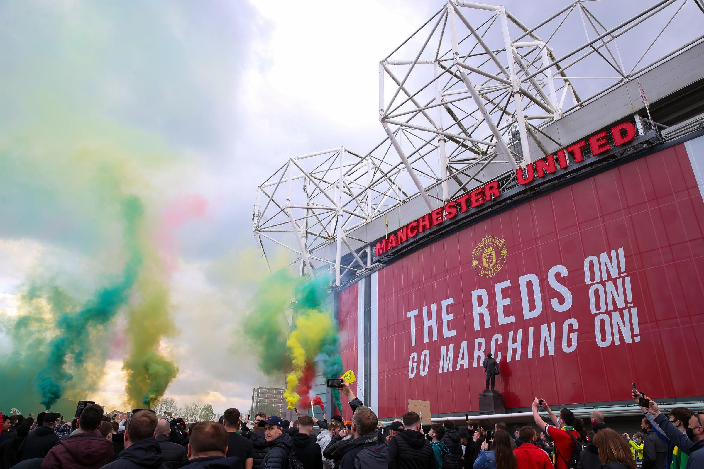 Fans let off flares as they protested against the Glazer family, the owners of Manchester United. Photo: PA
