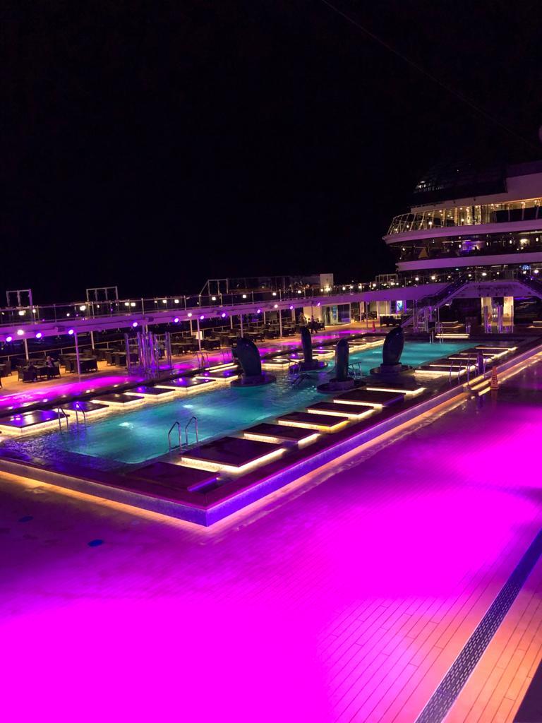 The Virtuosa pool area illuminated at night