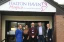 Halton Haven staff celebrate their £2000 boost from Merseyflow.