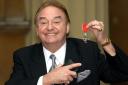 Gerry Marsden with his MBE for services to Liverpudlian charities (PA)