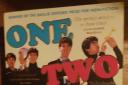 Front cover of 'One-Two-Three-Four: The Beatles in Time'  by award-winning author Craig Brown.