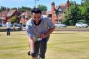 Refugee Rafiullah Enayet learns the art of crown green bowls during session in Port Sunlight. Picture: Craig Manning