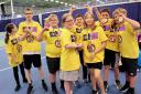 CHAMPIONS: Pupils from Holy Cross School in Birkenhead after winning the North West of England multisport title