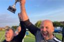 Lache's Andy Dutton celebrates their cup win