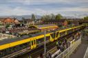 Racegoers travelling to and from The Grand National Festival at Aintree Racecourse by Merseyrail at the weekend