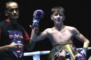 Wirral teen Thai boxing champion Joe Ryan celebrates after claiming fourth world title