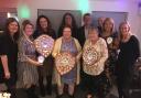Marge Dooley picture, centre, with her ‘Lifetime Achievement’ honour at the Cheshire LTA Tennis Awards.