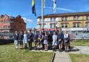 Pupils and staff from Egremont Primary after raising the Ensign on Monday