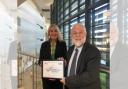Wirral Community Health and Care NHS Foundation Trust’s Chief Executive Karen Howell and Chair Michael Brown with their recent Veteran Aware Accreditation