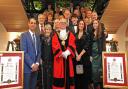 The mayor presented commemorative scrolls. L-R Paul's Husband Andre, Sister Sheila, Wirral Mayor, Daugher Sharyn