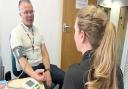 Dave Bradburn, Wirral's director of public health, is pictured getting his blood pressure checked as part of Know Your Numbers Week 2023