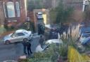 Armed police outside a property on Alexandra Road in Birkenhead