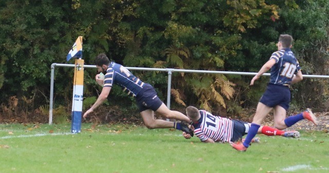 Paul The Seagull Sellwood scores one of his three tries for Anselmians